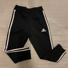 Adidas Toddler Regular Fit Tiro Pant. Casual White Pants For Playwear, Adidas Training Bottoms With Three Stripes, Adidas Training Bottoms, Adidas Training Pants With Three Stripes, Adidas Training Sportswear Bottoms, Adidas Sportswear Training Bottoms, Adidas Bottoms, Kids Bottoms, Black Adidas