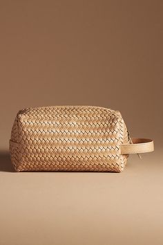 This cosmetic bag's soft, malleable shape makes it easy to pack, yet it retains its structure once out of your suitcase. | Pouchette Woven Leather Cosmetic Bag by Bembien in White, Women's, Cotton/Leather at Anthropologie Large Capacity Leather Pouch Clutch, Rectangular Travel Pouch With Leather Handles, Rectangular Leather Cosmetic Bag With Removable Pouch, Large Capacity Leather Clutch For Travel, Natural Color Pouch Box Bag For Travel, Natural Color Box Bag Pouch For Travel, Natural Pouch-shaped Box Bag For Travel, Natural Pouch Box Bag For Travel, Rectangular Travel Pouch In Natural Color