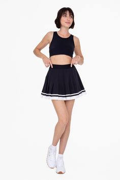 Crafted with perfect pleats, this tennis skirt features a contrast stripe trim in a high end grosgrain ribbon and built in undershorts with pockets for coverage and convivence.Kelsey is 5'9", a size 2, and is wearing an S100% recycled polyester Sporty Summer Pleated Tennis Skirt, Athleisure Pleated Stretch Tennis Skirt, Sporty Pleated Tennis Dress For Summer, Pleated Fitted Tennis Skirt For Sports, Sporty Pleated Hem Skort, Sporty Mini Pleated Skirt, Sporty Pleated Sports Shorts, Sporty Pleated Shorts, Sporty Pleated Shorts For Sports