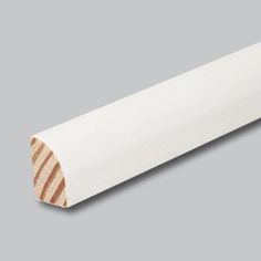 a roll of white paper on a gray background with an image of a wooden strip