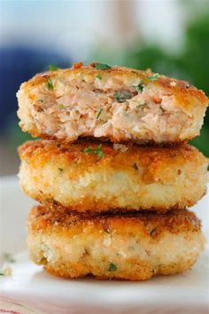 three crab cakes stacked on top of each other