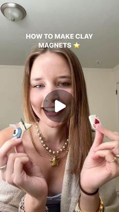 a woman holding up two fingers with the words how to make clay magnets on it