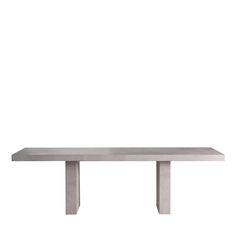 a rectangular concrete table with two legs on each side and one leg up against the wall