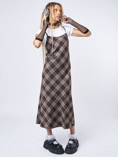 Shop our edit of trending y2k, dark academia, and grunge-inspired fashion staples like our Delia Brown Plaid Maxi Dress in brown with a check plaid pattern. Perfect for layering and ethically made to last. International shipping available. Fall Aesthetic Clothes, Layer Dress Outfit, 1990s Fashion Grunge, Y2k Dark Academia, Plaid Maxi Dress, Minga London, Fashion Decades, 90s Fashion Grunge, Maxi Dress Outfit