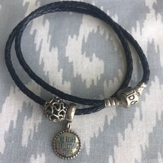 Navy Leather Pandora Bracelet With Family Charm And We Rise By Lifting Others Charm. Never Worn. We Rise By Lifting Others, Navy Leather, Pandora Bracelet, Bracelets And Charms, Womens Jewelry Bracelets, Charms, Women Jewelry, Bracelet, Navy