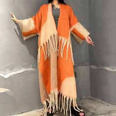 This super soft and warm wool cardigan kimono is perfect for the cold weather. Unlike other sweaters and wools, the wool used for this beauty is non itchy. Think of your favorite throw blanket, the comfort and warmth it gives but 10x stylish and wearable any where. This kimono is all that and more! One size fits S-4X Material: Wool One Size Fits Most Size Chart Long Acrylic Outerwear For Winter, Oversized Acrylic Outerwear For Layering, Oversized Long Acrylic Outerwear, Cozy Long Sweater For Winter, Cozy Long Winter Sweater, Long Sweater Coat For Fall Cold Weather, Long Sweater Coat For Cold Weather And Fall, Cozy Long Sweater For Fall, One Size Knit Sweater Coat For Winter