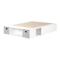 a white coffee table with drawers underneath it