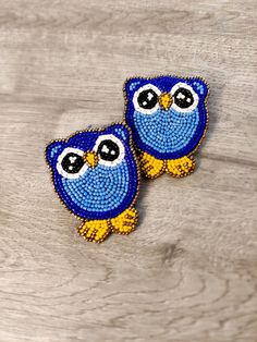 Cute Owl seed beads earrings are totally handmade. It has the charm that holds the attention of the crowd. Totally girlish and so new that you have not seen this unique design anywhere else. The vibrant colors and the making of the earring will surely have the quality to stand out in the crowd. They are So light weighted and easy to carry. I can say only one word for these earrings AWWWWWWWWWWWW. :) Playful Handmade Adjustable Earrings, Handmade Playful Round Bead Jewelry, Handmade Blue Novelty Earrings, Blue Handmade Novelty Earrings, Whimsical Beaded Earrings For Pierced Ears, Playful Handmade Round Bead Jewelry, Whimsical Beaded Earrings For Pierced Ears As A Gift, Playful Handmade Jewelry With Round Beads, Cute Multicolor Beaded Earrings