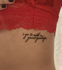 a woman's lower back tattoo with the words go to bed, i grow up