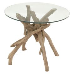 a glass top table with wooden sticks on the base and bottom, made out of driftwood