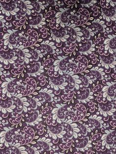 a purple and white floral print fabric