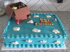 a birthday cake for a boy with toy story characters on it