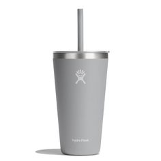 a stainless steel tumbler with a straw in the middle and a logo on the side