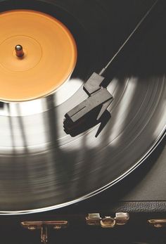 an old record player with its turntable spinning