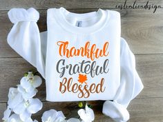 Thankful Grateful Blessed Sweatshirt, Thanksgiving Sweatshirt, Fall Sweat, Autumn Sweater, Thankful Sweatshirt, Pumpkin season, gift for her - How To Order ----- 1-) Please, check and review all the photos. 2-) Choose your t-shirt size and color. *We use more than one brand product. Different styles of shirts may have different shades of same color choice due to different manufacturer brands. *For this reason, we recommend you to match shirts from the same styles if you want precisely matching colors (ex. Unisex, V-necks, Toddler, etc.). 3-) Click add to cart. You can go back to add more shirts. 4-)Click "Proceed to check out". 5-)When you check out, you can add a note to seller for any request. ----- Unisex Shirts ----- * Unisex t shirt fits like a well-loved favorite, featuring a crew ne Thanksgiving Sweatshirt Ideas, Thankful Sweatshirt, Grateful Shirt, Thanksgiving Sweater, Thanksgiving Sweatshirt, Autumn Sweater, Thankful Grateful Blessed, Diy Sweatshirt, Pumpkin Season