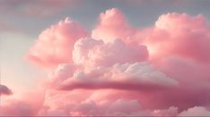 pink clouds in the sky at sunset