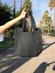 Any woman must have this bag for every fashionista.Whether you keeping it to yourself or gifting someone you care, it will be unforgettable. ✔️I made this beautiful bag from black natural paper rope which is organic cotton. ✔️The interior of the straw summer bag has a magnetic button. Suitable for use as shoulder bag, beach bag or party bag ✔️You can combine your clothes with a straw summer bag on summer days ✔️Handcrrafted in Turkey ✔️Hand-crocheted with care ✔️This bag is light weight yet dura Trendy Square Bucket Bag For Beach, Trendy Square Bucket Bag For The Beach, Chic Large Capacity Bags For Vacation, Trendy Square Shoulder Bag For Vacation, Trendy Square Bucket Bag For Vacation, Trendy Large Capacity Crochet Shoulder Bag, Lightweight Bags For Daily Use, Trendy Lightweight Rectangular Bags, Trendy Lightweight Straw Shoulder Bag