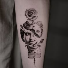 a woman's face with roses on her arm