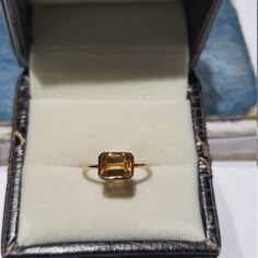 14k solid rose gold natural AAA quality emerald cut rectangular shaped citrine semi precious gemstone ring. 1. The weight of the natural citrine gemstone used in the ring =1.10 cts. 2. The weight of 14k solid rose gold used in the ring =1.130 grms. 3. The design of the ring is very nice and beautiful. 4. I have used all my skills and experience to manufacture this ring as beautiful as I can and I do hope my work will be appreciated. Thanks Modern Gold Topaz Ring In Rectangular Shape, Modern Gold Rectangular Topaz Ring, Formal 14k Gold Emerald Rectangular Ring, Rectangular Yellow Gold Topaz Ring, Elegant Octagon Citrine Rings, Classic Rectangular Emerald Gemstone Ring, Yellow Gold Citrine Topaz Ring, Emerald Cut, Rectangular Topaz Ring In Yellow Gold, Modern Yellow Gold Topaz Ring With Rectangular Shape