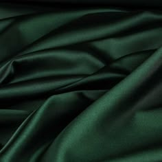 the dark green fabric is very soft and shiny, it looks like something that could be used