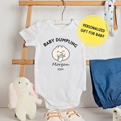 ⭐⭐Just a friendly reminder: Our Holiday deadline is December 10 🎄Orders placed after that may not arrive by Christmas, but we'll do our best! Thank you for your understanding and support!💕 This Personalized little Bao Bun Dumpling baby bodysuit is great for your little ones or as a baby shower gift, pregnancy announcement, birthday gift, and more! It is the perfect keepsake to celebrate the joy of new beginnings and create lasting memories. More Family Matching Clothing Designs. Please check o Clothes Asian, Party Bodysuit, Matching Clothing, Bao Buns, Newborn Clothes, Asian Kids, Clothing Designs, Personalized Baby Gifts, Dim Sum