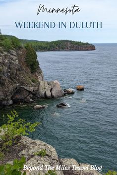 the water and rocks at minnesota's weekend in duuthh, with text overlay