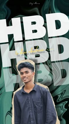 a man standing in front of a green and white background with the words hbd on it