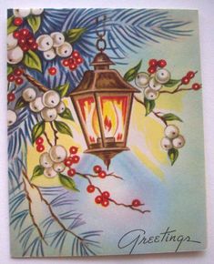 a christmas card with a lantern hanging from a tree branch and berries on the branches