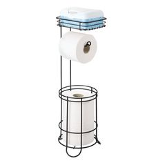 two rolls of toilet paper sitting on top of a metal rack next to a roll of toilet paper