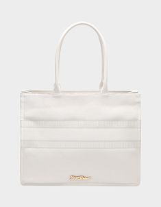 Looking for the perfect bachelorette tote? Look no further! This white canvas BRIDE TOTE BAG is the ultimate accessory for your special day. Make a statement as you sashay down the aisle with this beautiful and festive bag carrying all of your bridal essentials! Canvas textile material 14" L x 5.5" Dx 11" H Imported Luxury White Canvas Bag With Top Carry Handle, White Luxury Canvas Shopping Bag, Luxury White Canvas Shopping Bag, Luxury White Canvas Bag For Daily Use, Luxury White Rectangular Canvas Bag, Trendy White Canvas Bag, White Canvas Shopping Bag With Top Carry Handle, White Canvas Tote Bag With Top Carry Handle, White Canvas Shoulder Bag With Top Carry Handle