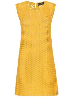 a women's yellow dress with holes on the front and bottom, made out of crochet