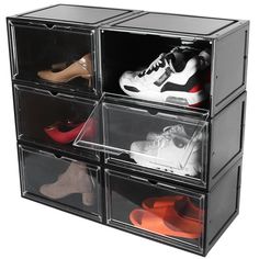 four clear storage bins with different shoes in each compartment on the bottom one is filled with various pairs of shoes