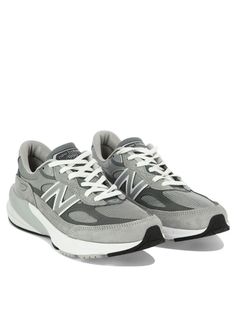 New Balance's low-top sneakers crafted in grey suede mesh with reflective details. Featuring lace-up closure, a round-toe silhouette, ENCAP midsole, fabric lining and comfort and FuelCell rubber outsole. The design is completed by the unmistakable reflective N patch embroidered on side and NB detailing at heel.Gender: MENMaterial: PIGSKIN/MESHColor: GREYMade in: USProduct ID: M990GL6COOLGREY*Import tax/duty will be calculated at checkout (If applicable) New Balance Made In Usa, Sneaker New Balance, Grey New Balance, Sporty Pants, Balance Sneakers, Comfort Design, Loafer Sneakers, New Balance Men, New Balance Sneakers