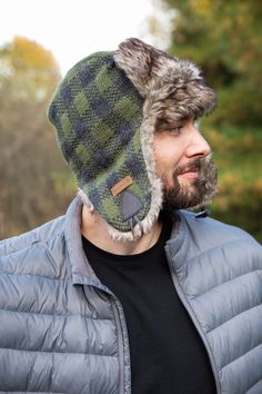 Inspired by Russian ushanka hats, the Chase Trapper is one of our snuggest pieces of headgear. The Buffalo Plaid pattern channels a great-outdoorsmen vibe, while the horn button and leather clasp under the chin is both practical and suave. This hat is fully lined with fleece and faux fur around the earflaps. 100% wool Fleece & faux fur lined Handmade in Nepal Fair Trade Federation Member Dry clean/hand-wash only Russian Ushanka, Buffalo Plaid Pattern, Trapper Hat, Sweater Hat, Fleece Hat, The Horn, The Chase, Trapper Hats, Wool Winter