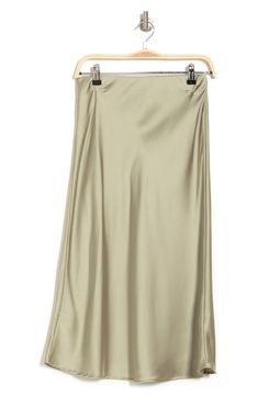 Elevate your wardrobe with this pull-on bias satin midi skirt for elegant, feminine style. 31" length (size S) Elasticized waist Pull-on style Satin construction 97% polyester, 3% spandex Machine wash cold, line dry Made in USA Model’s stats for sizing: 5’10” height, 34” bust, 27” waist, 35” hips. Model is wearing size S. Elegant Feminine Style, Midi Skirt Outfit, Sage Color, Satin Midi Skirt, Elegant Feminine, Nordstrom Store, Skirt Outfits, Feminine Style, Nordstrom Rack