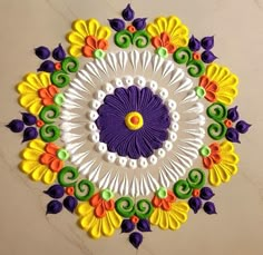 a colorful circular design on the wall