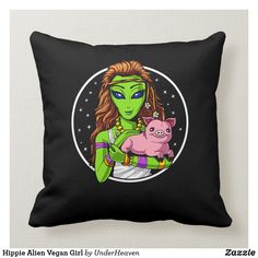 an alien girl holding a pink pig on a black pillow with the words hippie aliens vegan girl underneath it