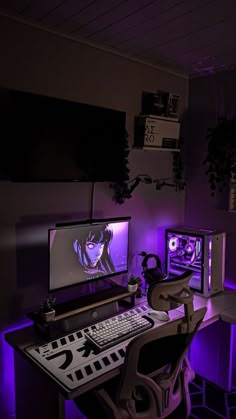 a computer desk with two monitors and a keyboard on it in a room lit up by purple lighting