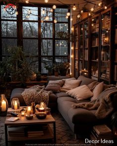 a living room filled with lots of furniture and candles