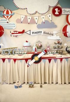 an airplane themed birthday party with balloons and decorations