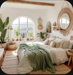 a bedroom with white walls and lots of plants in the window sill, along with a large bed