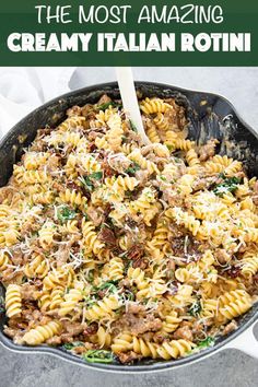 the most amazing creamy italian rotini recipe is in a cast iron skillet and it's ready to be eaten