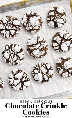 chocolate crinkle cookies with powdered sugar on top and text overlay reading easy & delicious chocolate crinkle cookies