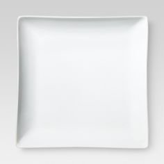 a white square plate on a gray background