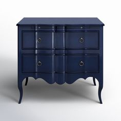 an image of a blue dresser with drawers