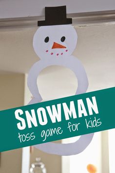 a snowman game for kids hanging from the ceiling with text overlay that reads, snowman toss game for kids