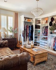 a living room filled with furniture and lots of closet space