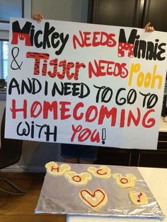 a sign that says mickey needs annie and tiger needs pooh and i need to go to home coming with you