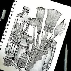 a drawing of brushes and other items in a vase