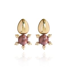 The Tulia Earrings in Chocolate Cherry are a chic addition to any wardrobe that favors clean lines and metallic accents. Featuring a hand-painted wooden center, gold hematite beads, and an 18K gold-plated teardrop post, these earrings offer versatile style with a touch of sophistication. Available in modern neutrals, the Tulia Earrings effortlessly elevate any outfit, from breezy linen sundresses to sharp tailored trousers.  Materials: Non-toxic Paints, Wood Base, 18K Gold Plated Brass Beads, 18 Smart Glass, Brass Beads, Stocking Fillers For Her, Forever Jewelry, Chocolate Cherry, Hematite Beads, Jewelry Ring Box, Men's Jewelry Rings, Watch Necklace